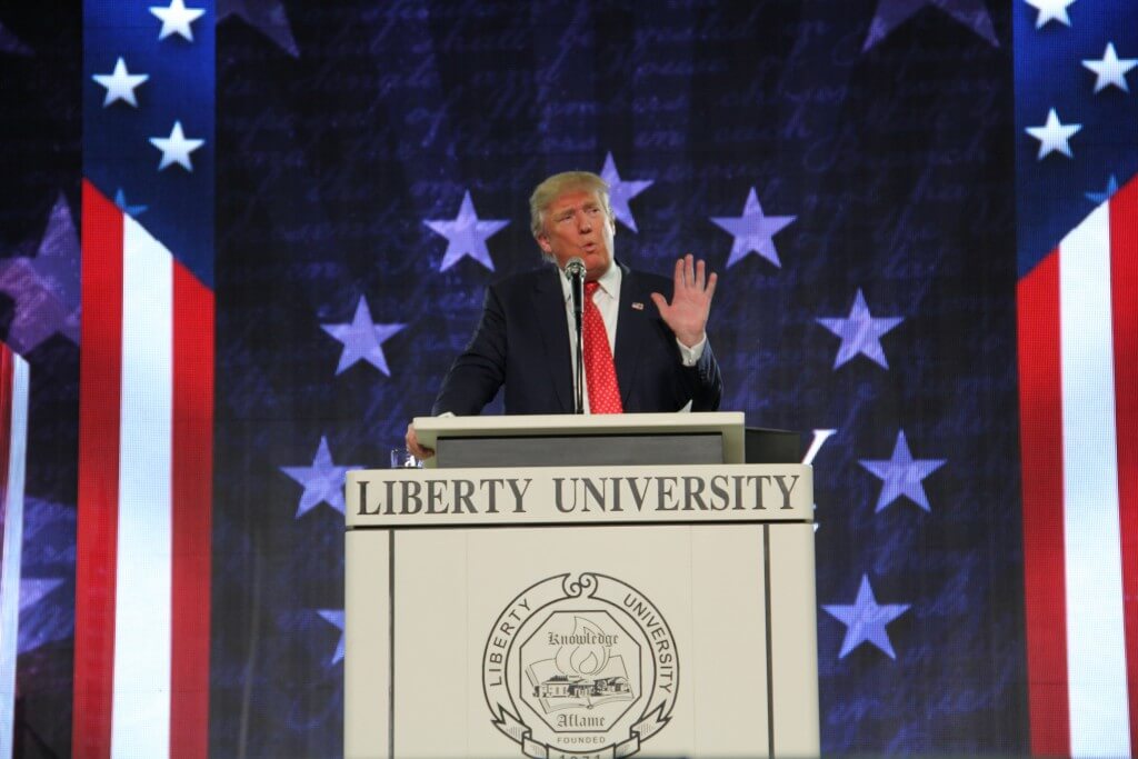 Donald Trump, Republican presidential candidate, spoke at Liberty University on MLK Day. Vice President Joe Biden joked about Trump in a speech at a House Democratic retreat Thursday.