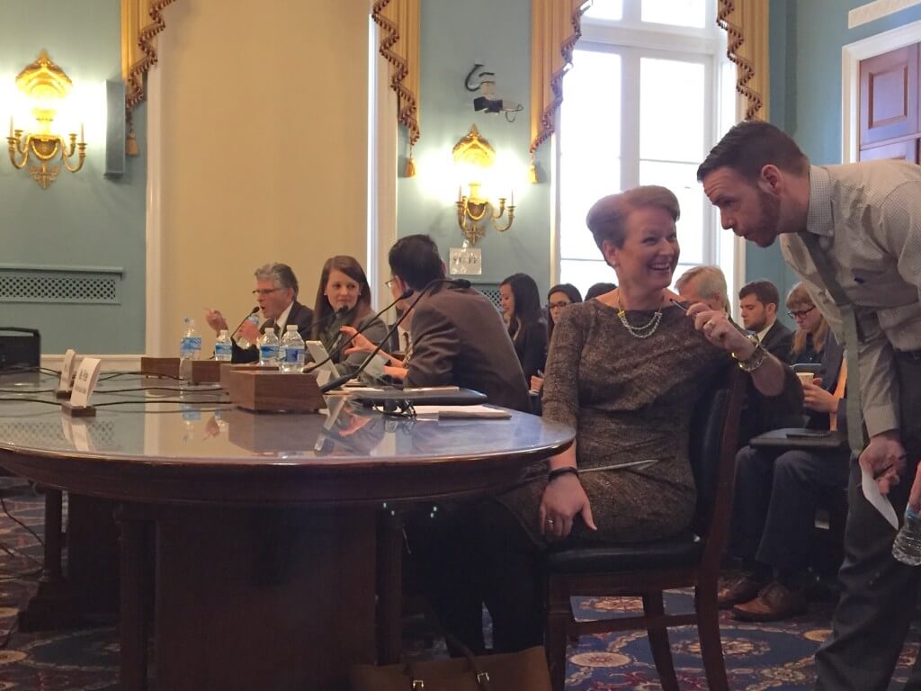 Witnesses chat with aides before the nutrition subcommittee hearing.
