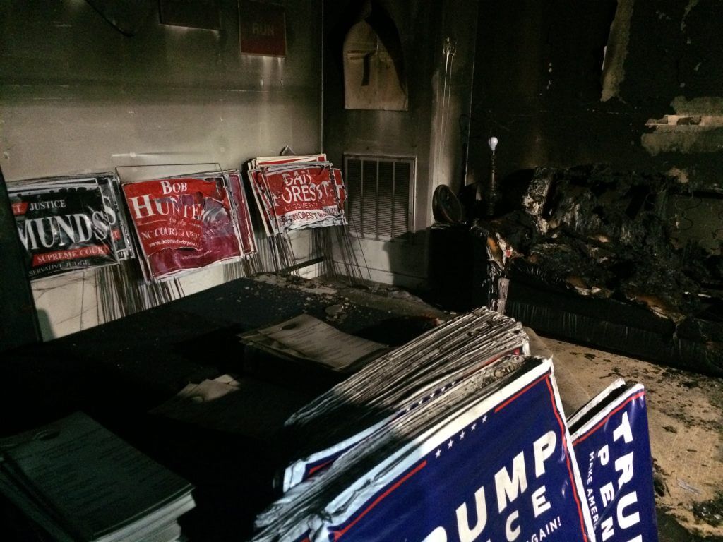 The aftermath of the firebombing at the Orange County Republican office.