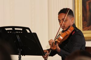 Peirce Ellis of the Perfect Fourth String Quartet from the Sphinx Overture performs at the award ceremony. "Wow, drop the mic," First Lady Michelle Obama said after the quartet's performance. (Kelly Norris/MNS).