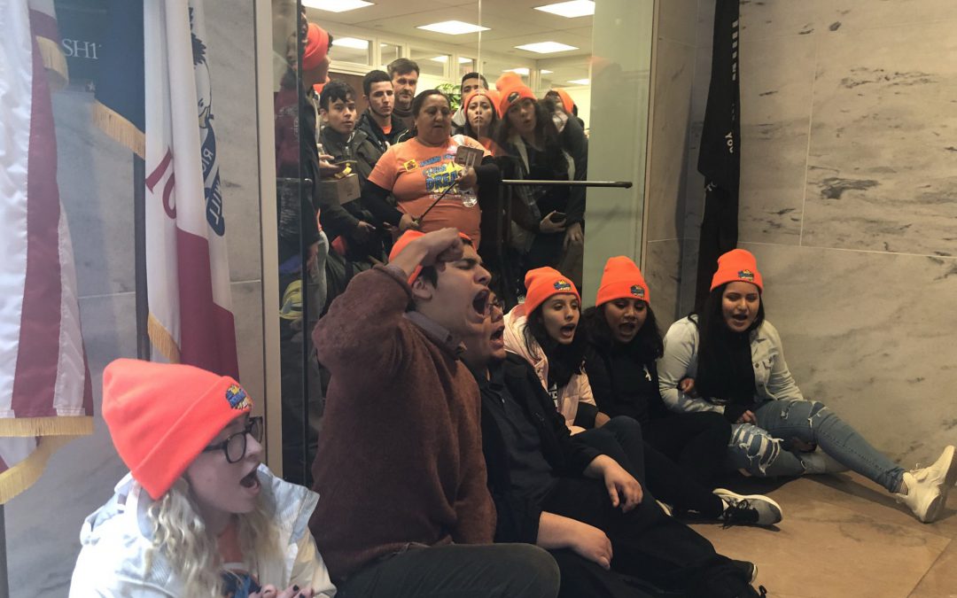 Protesters swarm Senate office building demanding a fix for DACA