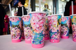 Cups adorned with artwork by Maggie O'Neill, the festival's official artist, were given away to attendees. (Rhytha Zahid Hejaze/MNS)