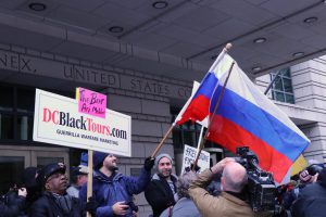 People held Russian flags and played the National Anthem of the U.S.S.R. long after Stone had left the courthouse.