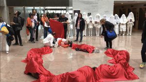 A broken heart in Hart: After the visits to lawmakers, the group began their “arrestable action.” They used their bodies and red fabric to create a “broken heart” on the first floor of the Hart building. (Gabrielle Bienasz/MNS)