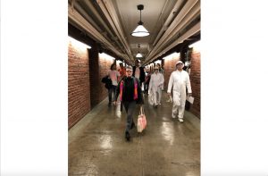 Jeremy Tjhung and Kimberly Miller walk in in the lower floors of the Russell Senate building headed to lawmakers office to “shame” lawmakers who do not support stricter gun laws and to deliver thank-you Valentines to the ones who do. (Gabrielle Bienasz/MNS)