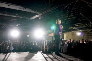 The crowd cheered as Warren outlined her major policy goals like ending Washington corruption by eliminating corporate lobbying. (Ester Wells/MNS)