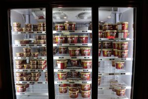 Freezers holding the Backroom’s homemade ice cream. They have nearly three dozen flavors including their locally famous Mudslide.  (Charlotte Walsh/MNS)