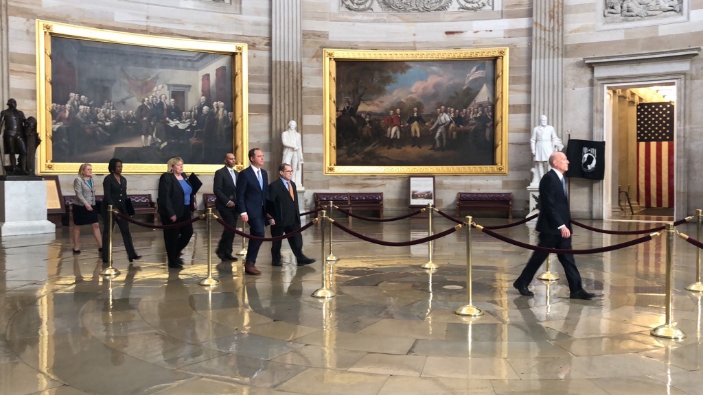 Senators sworn is as jurors as trial gets under way