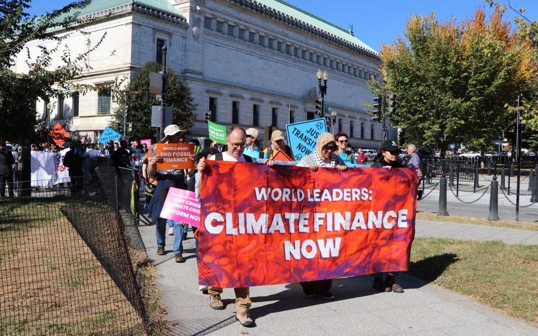 Photos: IMF and World Bank annual meetings draw climate, humanitarian protesters