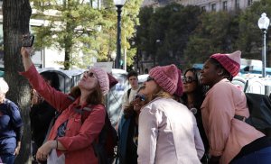 Many marchers wore pink clothing and hats, a symbol of female solidarity. (Caroline Killilea/MNS)