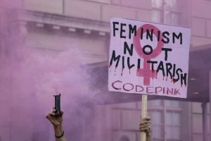 Pro-Palestine protesters also attended the march, setting off a pink smoke bomb and gathering along 15th Street. (Caroline Killilea/MNS)