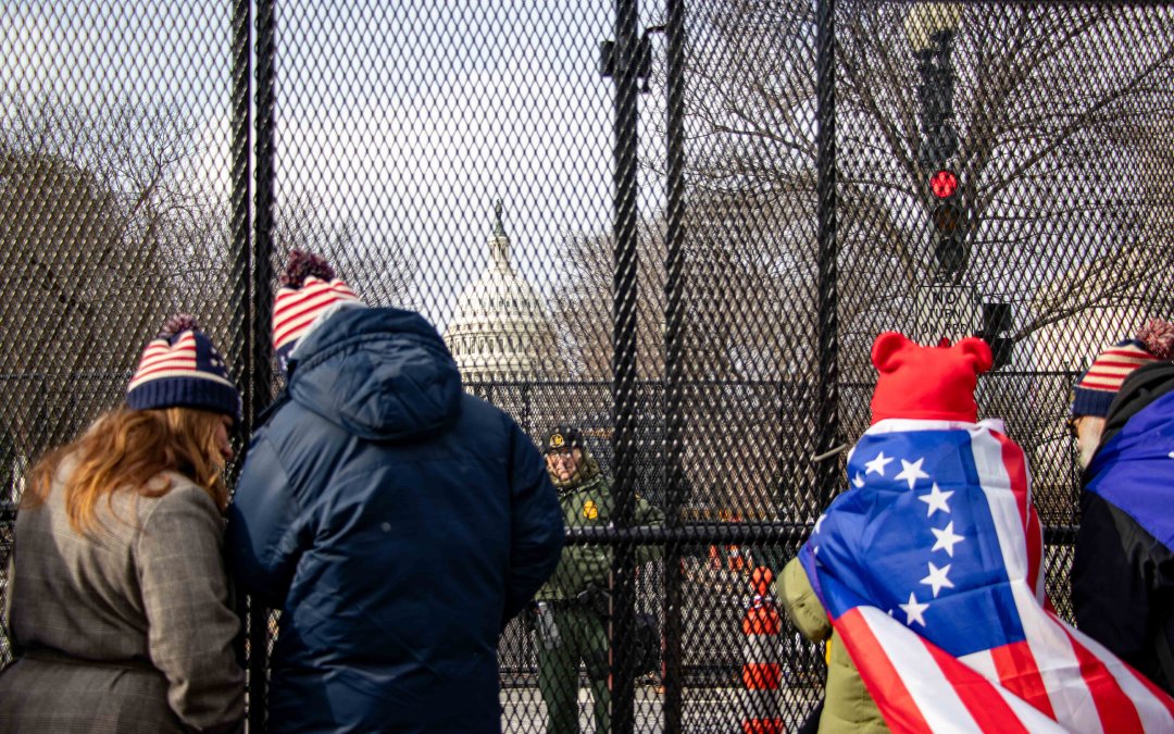 Photo Gallery: Looking in, but fenced out