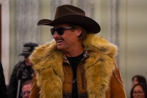 Kid Rock entered the hearing wearing a cowboy hat, fur coat and sunglasses. (Cayla Labgold-Carroll/MNS)