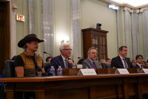 From left to right: Kid Rock, Executive Vice President of Corporate and Regulatory Affairs for Live Nation, Dan Wall, Executive Director of Ticket Policy Forum, Brian Berry, and Co-Founder of the Colorado Independent Venue Association, David Weingarden gave statements during the hearing. (Cayla Labgold-Carroll/MNS)