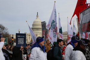 Tens of thousands of protesters marched past the U.S. Capitol on their way to the Supreme Court on Friday. (Ben Shapiro/MNS)