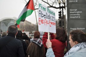 Protesters gathered outside of the U.S. Institute of Peace, at which world leaders pledged a combined $7 billion for Gaza’s reconstruction.