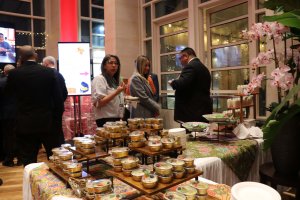 Participants gather to enjoy Singaporean food and drinks offered as part of the event’s cultural showcase. (Dasha Dubinina/MNS)