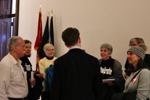 Participants speak with a legislative assistant in Sen. Bill Hagerty’s, R-Tenn., office during one of several lawmaker visits aimed at opposing the measure. (André Hiroki/MNS)