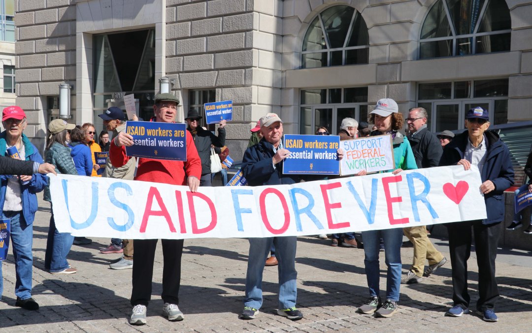 In photos: Former USAID employees rally one year after shutdown